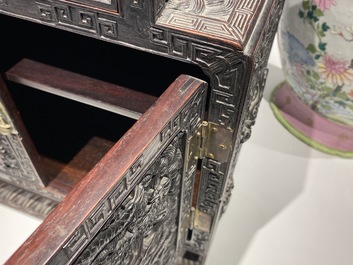 Un petit cabinet en bois sculpt&eacute; &agrave; d&eacute;cor de dragons, Chine, R&eacute;publique
