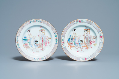 A pair of fine Chinese famille rose ruby back plates with figures in an interior, Yongzheng