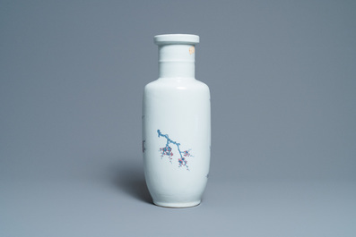 A Chinese blue, white and copper-red rouleau vase with birds among blossoming branches, 20th C.
