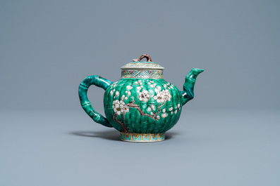 A Chinese verte biscuit teapot and cover, Kangxi