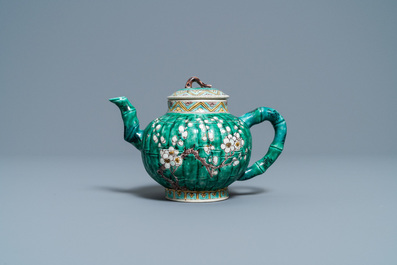 A Chinese verte biscuit teapot and cover, Kangxi