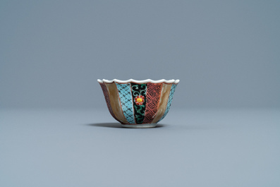 A lobed Chinese famille rose 'fishermen' cup and saucer, Yongzheng