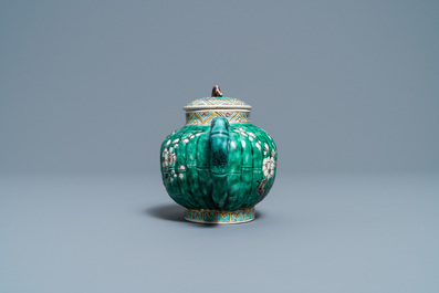 A Chinese verte biscuit teapot and cover, Kangxi