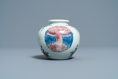 A Chinese blue, white and copper-red 'phoenixes' water pot, Kangxi mark, 19th C.