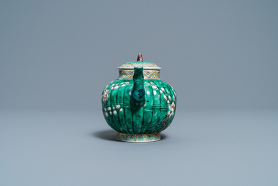 A Chinese verte biscuit teapot and cover, Kangxi