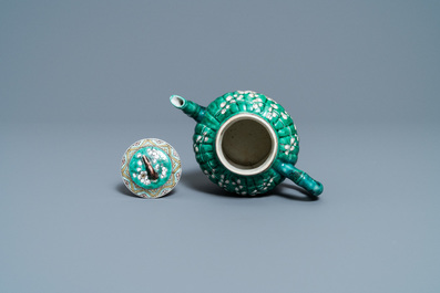 A Chinese verte biscuit teapot and cover, Kangxi