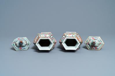 Two Chinese hexagonal Canton famille rose vases and covers, 19th C.