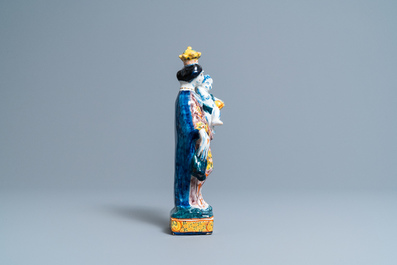 A polychrome Dutch Delft figure of the Madonna with child, 18th C.