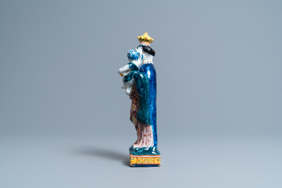 A polychrome Dutch Delft figure of the Madonna with child, 18th C.