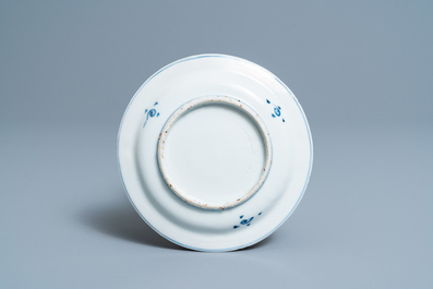 A Chinese blue, white and copper-red 'fish' plate, Wanli