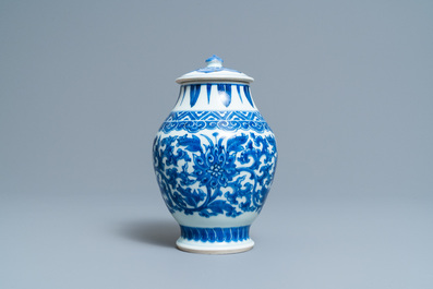 A Chinese blue and white 'lotus scroll' jar and cover, Transitional period