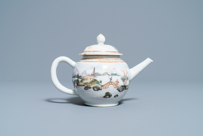 A fine Chinese 'landscape' teapot and a pair of cups and saucers, Yongzheng