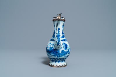 A Chinese blue and white silver-mounted ewer and cover, Transitional period