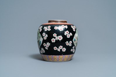 A Chinese black-ground famille rose jar, 19th C.