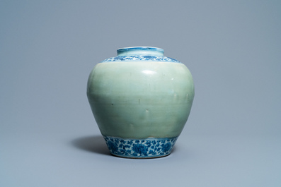 Een Chinese blauw-witte en celadon vaas met lotusslingers, Ming