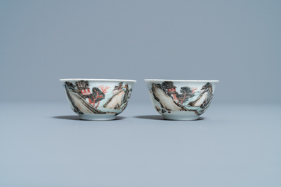 A fine Chinese 'landscape' teapot and a pair of cups and saucers, Yongzheng