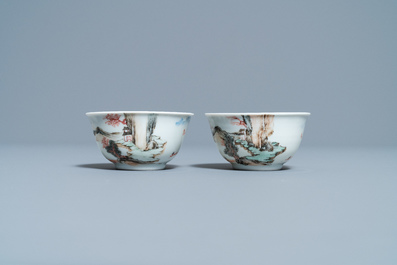 A fine Chinese 'landscape' teapot and a pair of cups and saucers, Yongzheng