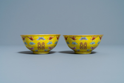 A pair of Chinese famille rose yellow-ground 'butterfly' bowls, Tongzhi mark, 20th C.