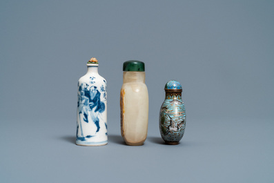 Three Chinese chalcedony, cloisonn&eacute; and porcelain snuff bottles, 19th C.