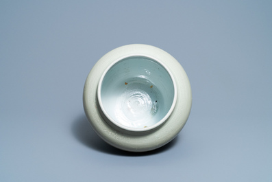 A globular Chinese monochrome celadon 'dragon' vase, Kangxi