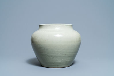 A globular Chinese monochrome celadon 'dragon' vase, Kangxi