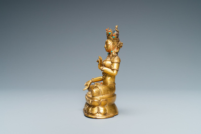 Une figure de Tara en bronze dor&eacute; incrust&eacute; de corail et de turquoise, Sino-Tibet, 18&egrave;me