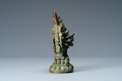 A Sino-Tibetan bronze group of Mahakala and Yab-Yum, 18/19th C.