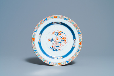 A Chinese blue and white 'lotus' dish and a famille verte dish, Kangxi