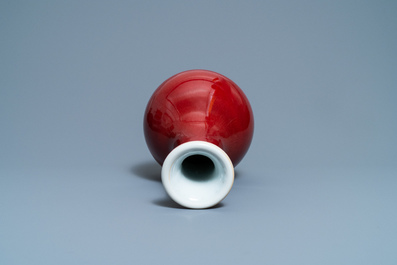 A Chinese monochrome langyao-glazed bottle vase, marked 'Made in Jingdezhen in 1955'