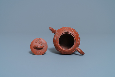 A Chinese Yixing stoneware teapot with squirrels among grapevines, Kangxi