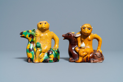 Two Chinese sancai-glazed 'monkey on deer' ewers, 19th C.