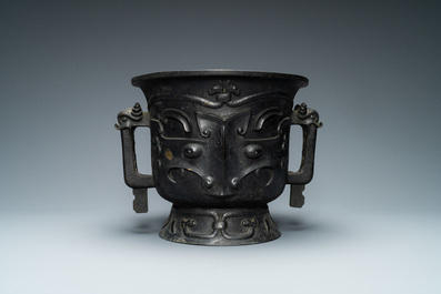 A large Chinese gold-splashed bronze 'taotie' censer, 19/20th C.