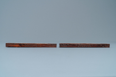 A pair of Chinese inlaid wooden wrist rests, 19/20th C.