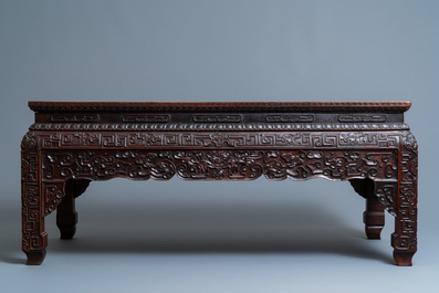 A Chinese huanghuali wood 'kangzhuo' low table, 18th C.