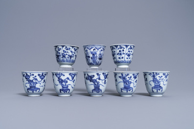 Eight Chinese blue and white cups and saucers, Kangxi