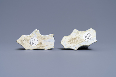 A pair of Dutch Delft blue and white models of lions, 18th C.