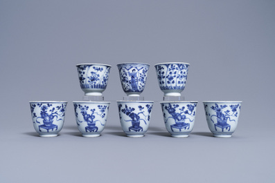 Eight Chinese blue and white cups and saucers, Kangxi
