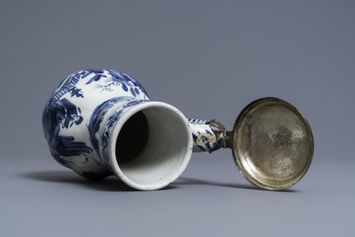 A silver-mounted Dutch Delft blue and white chinoiserie jug, 17th C.