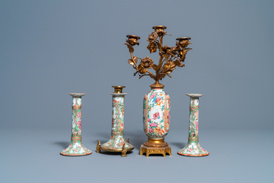 Three Chinese Canton famille rose candlesticks and a vase with gilt bronze mounts, 19th C.