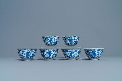 A collection of Chinese and Japanese blue and white cups and saucers and two ewers, Wanli and later