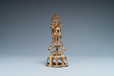 A Chinese gilt bronze figure of Buddha standing, probably Northern Wei dynasty