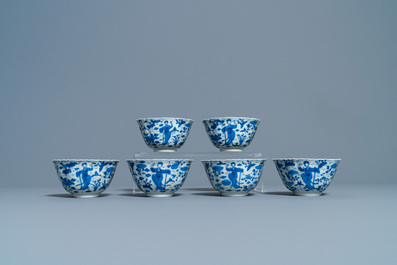 A collection of Chinese and Japanese blue and white cups and saucers and two ewers, Wanli and later