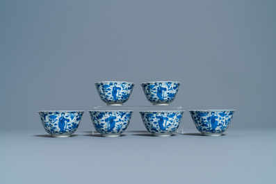 A collection of Chinese and Japanese blue and white cups and saucers and two ewers, Wanli and later