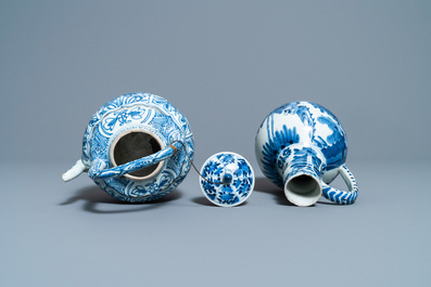 A collection of Chinese and Japanese blue and white cups and saucers and two ewers, Wanli and later