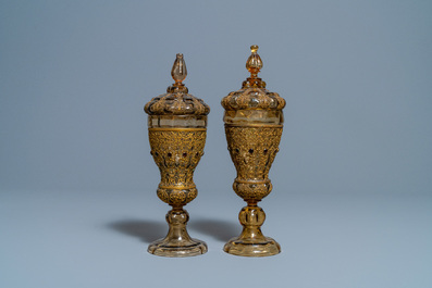 A pair of Russian or Eastern-European gilt copper and glass-inlaid glass goblets and covers, 19th C.