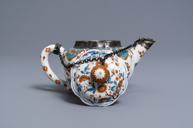 A polychrome petit feu and gilded Dutch Delft teapot and cover, early 18th C.