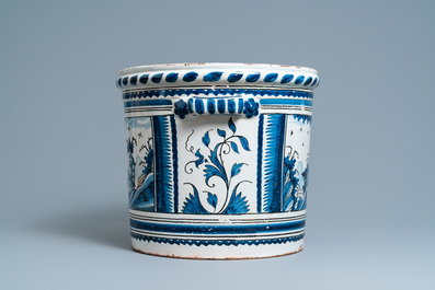 A large blue, white and manganese 'landscape' jardini&egrave;re, Nevers, France, 18th C.