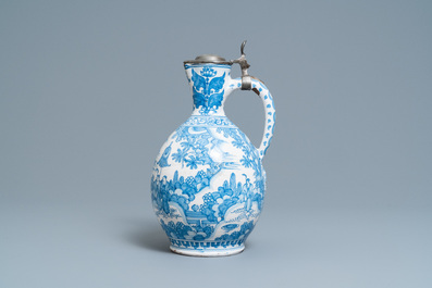 A large Dutch Delft blue and white chinoiserie jug with pewter cover, 17th C.