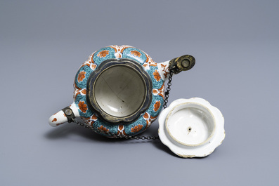 A polychrome petit feu and gilded Dutch Delft teapot and cover, early 18th C.