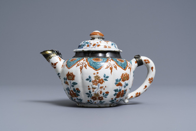 A polychrome petit feu and gilded Dutch Delft teapot and cover, early 18th C.